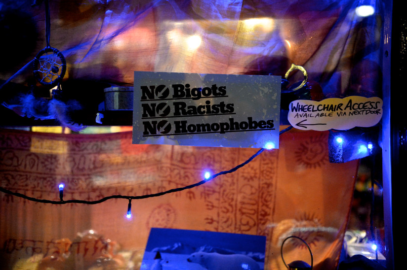 Photo of a sign telling customers that bigots, racists and homophobes are not welcome at the restaurant