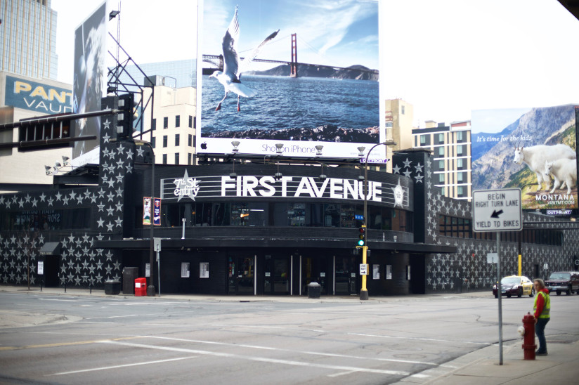 Photo of historic music club (with large billboards and names of artists written in stars) in Minneapolis, Minnesota