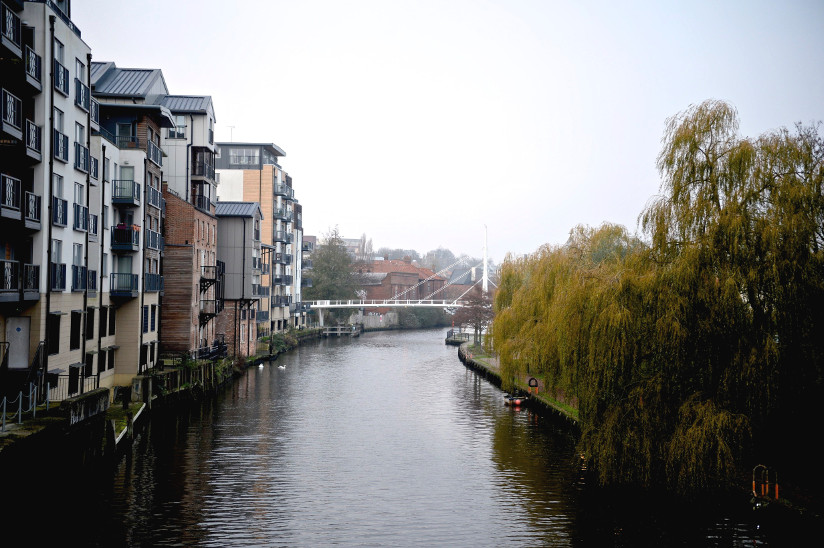 Photo of a new and modern apartment building by the Wenzum river in Norwich, England