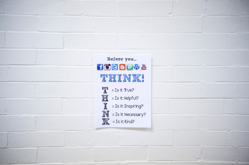 Photo of a classroom poster encouraging mindful use of social media